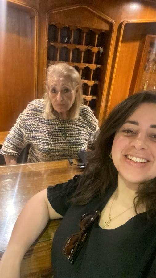 Mervat at the reception desk today with her granddaughter May
